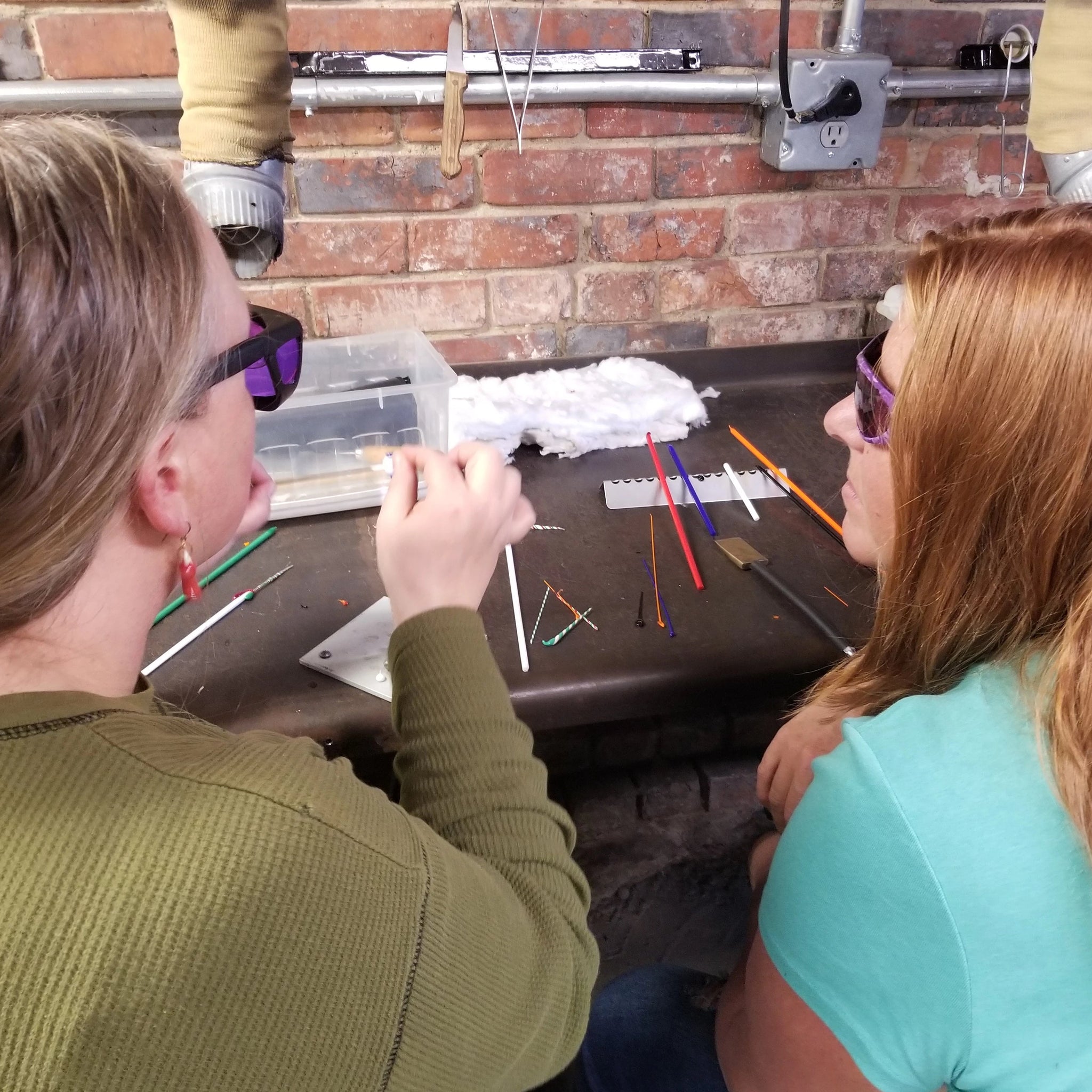 Flameworking instructor Gina Edwards and Student