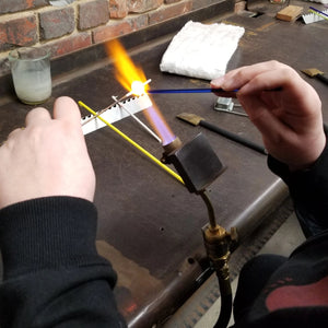 Making a bead in the flameworking studio